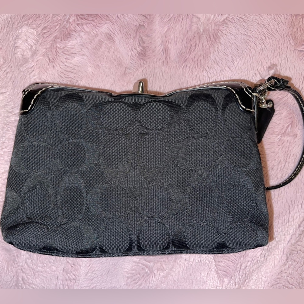 Coach wristlet.. Preloved with twist closer